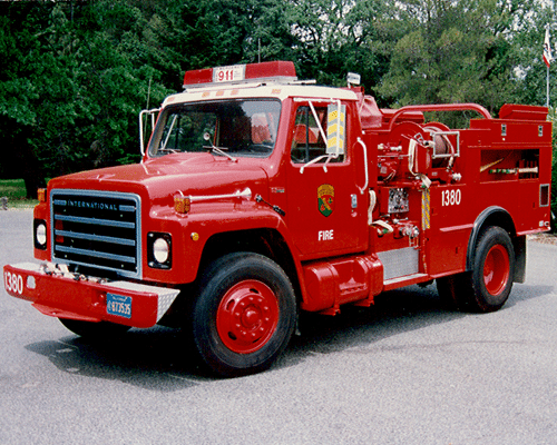 A small Vintage fire engine in red color